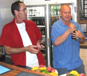*Behind the bar: As always, Pat Taylor (left) and Peter Smith was quick to put their hands up to volunteer for a job for the night.